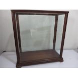 A small shop display cabinet with hand made shelf