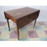 A Georgian mahogany Pembroke table with drawer to both ends