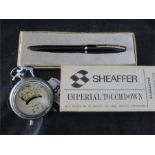 A cased Sheaffer fountain pen along with a vintage Voltmeter