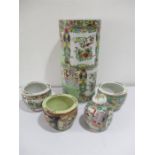 Five pieces of modern Chinese Famille Rose pottery including an umbrella stand