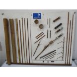 A board showing the progression of split bamboo rod making, made and used by Marcus Warwick