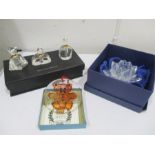 A boxed set of three perfume bottles (The Jordana Collection), a glass flower candle holder etc