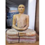 A wooden Sri Lankan seated figure of Buddha