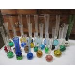 A collection of glass bud vases