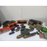 A collection of various Hornby train Locomotives, Carriages, various buildings, scenery, track etc