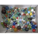 A collection of various vintage marbles