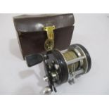 An Abu Ambassadeur 5000c early model reel in leather case. serial number 14766