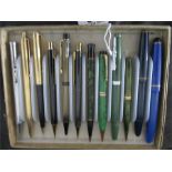 A tray of twelve vintage pens and pencils