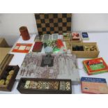 A quantity of various vintage games including a chess set, double nine dot dominoes ( both complete)