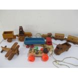 A collection of vintage pull along toys including a Fisher Price "Little Snoopy" etc