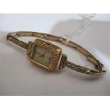 A 9 ct gold ladies Rolex Tudor cocktail watch on 9 ct gold expandable strap