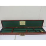 A Marcus Warwick mahogany fly fishing rod presentation case with brass fittings (key in office)