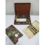 A mahogany cased paint set, a small used wooden palette along with a Winsor & Newson's Scholastic