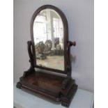 A Victorian toilet mirror with two drawers under