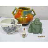 A Crown Ducal Art Deco two handled bowl, a "Jade" Buddha figure, Crown Devon moustache cup decorated