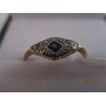 An Art Deco diamond and sapphire ring set in 18ct gold