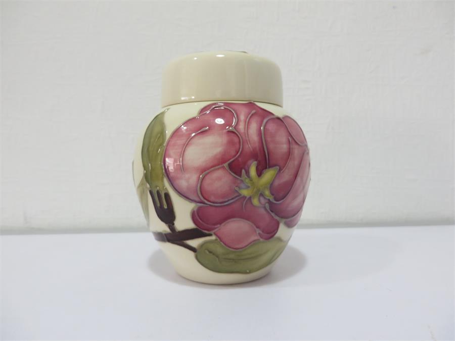 A small Moorcroft pot and cover