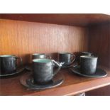 A six piece pottery coffee set