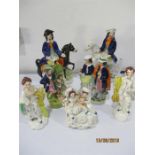 Seven Staffordshire figure groups including Dick Turpin and Tom King - All A/F
