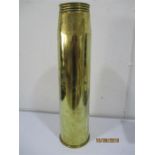 A large British naval 4 1/2 inch shell dated 1971, supposedly brought back from the Falklands War,