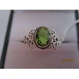 A 925 silver ring set with peridot