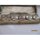 A cased set of silver plated livery buttons, by Firmin & Sons, Strand, London, crested