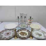 Six various plates along with two pairs of candlesticks and a jug