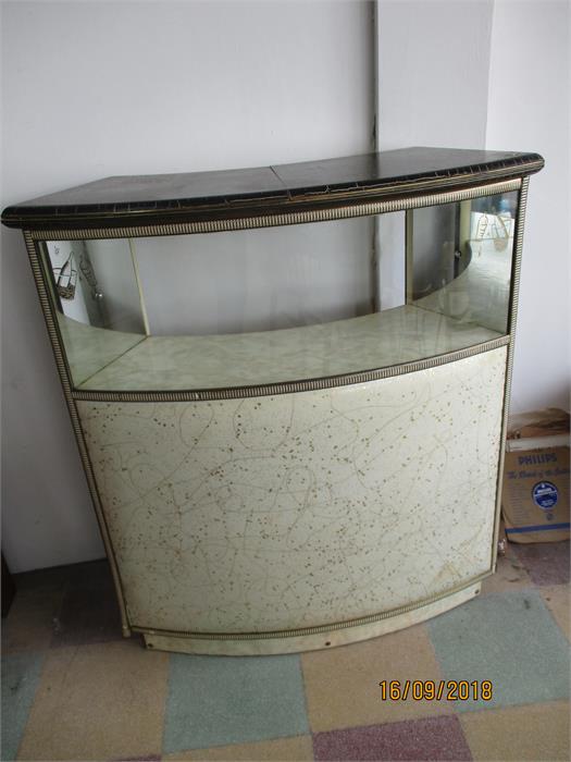 A 1960's cocktail bar with fold out top
