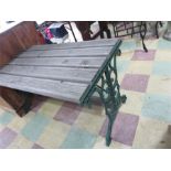 A garden table with cast iron ends
