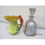 A Burleigh Ware jug decorated, the handle in the form of a parrot along with an Art Deco