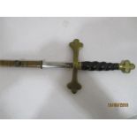 A Ceremonial sword, possibly Masonnic in leather scabbard