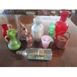 A collection of miscellaneous items including a ship in a bottle, soapstone, Chinese tea pot,