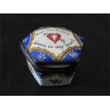 A 19th Century enamelled patch pot with hand painted decoration of a love heart and "Alas love's