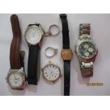 Five various watches along with two silver rings and a fine chain