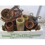 A quantity of terracotta flower pots, lawn edgers etc.