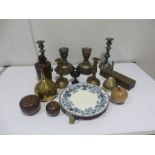A quantity of items to include, cooper warming plate, treen, brass and copper funnels,