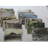 A collection of various vintage postcards