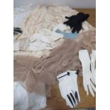 A selection of vintage lace, ladies gloves etc.