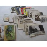 A collection of various postcards including Axminster and other local interest