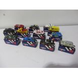 A collection of twelve boxed Corgi diecast cars
