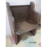 A pitch pine single seat pew with rope detailing to sides