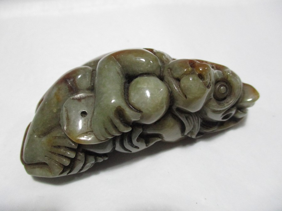 A Jade carving of a monkey