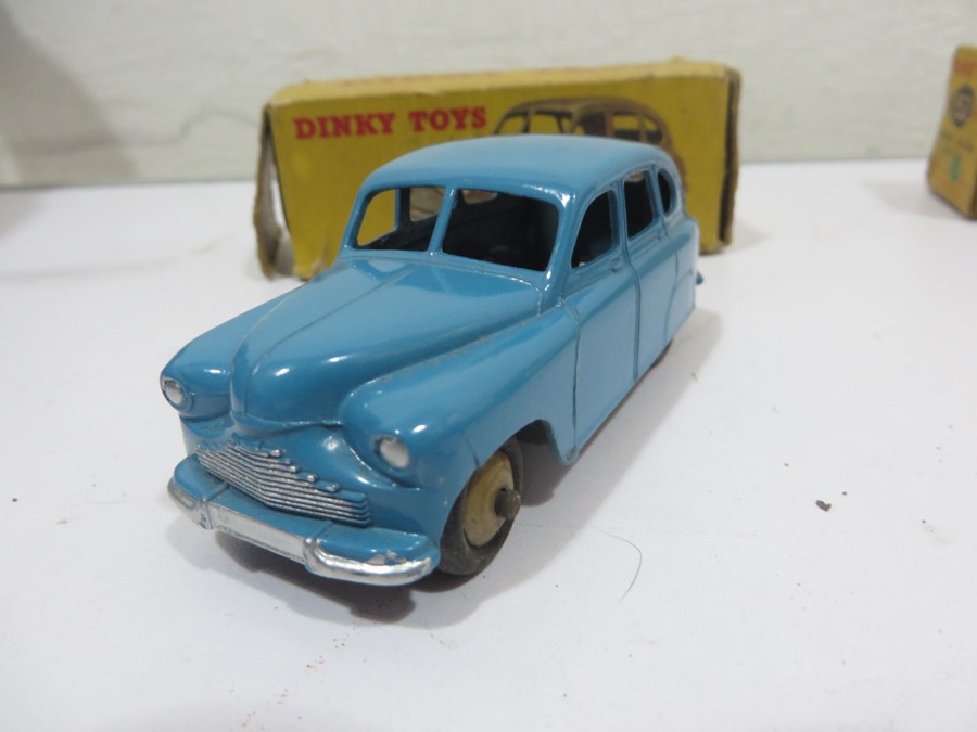 Two boxed Dinky Toys diecast car models, an Austin Devon Saloon (152) 40D and a Standard Vanguard - Image 10 of 16