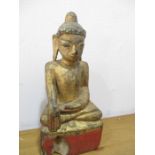 A Burmese 18th century wooden seated figure of Buddha, approx 32 cm height