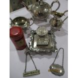 A silver plated inkwell along a post box money box and a silver plated tea set and two whiskey