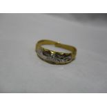 A high carat Middle Eastern two tone ring, markings to inside of shank- misshapen (4.2g weight)