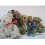 Four teddy bears and a Dolly Darling