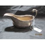 A hallmarked silver gravy boat ( legs splayed), weight 285.9g