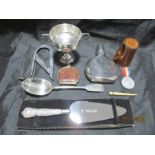 A hallmarked silver serving spoon, silver handled cake slice, nutcracker, dental mirror,