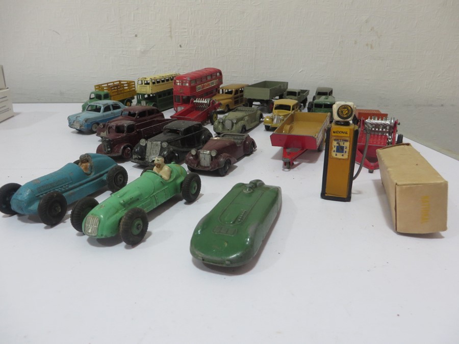 A quantity of diecast Dinky toys and cars including M.G Record Car, H.W.M (23J), Routemaster Bus,